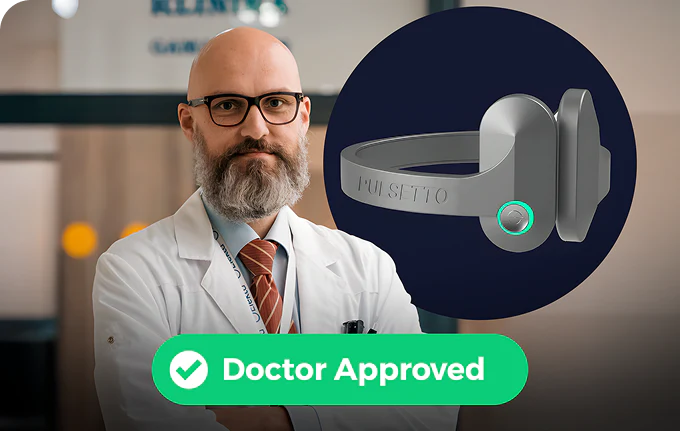 Doctor with folded arms wearing a white coat